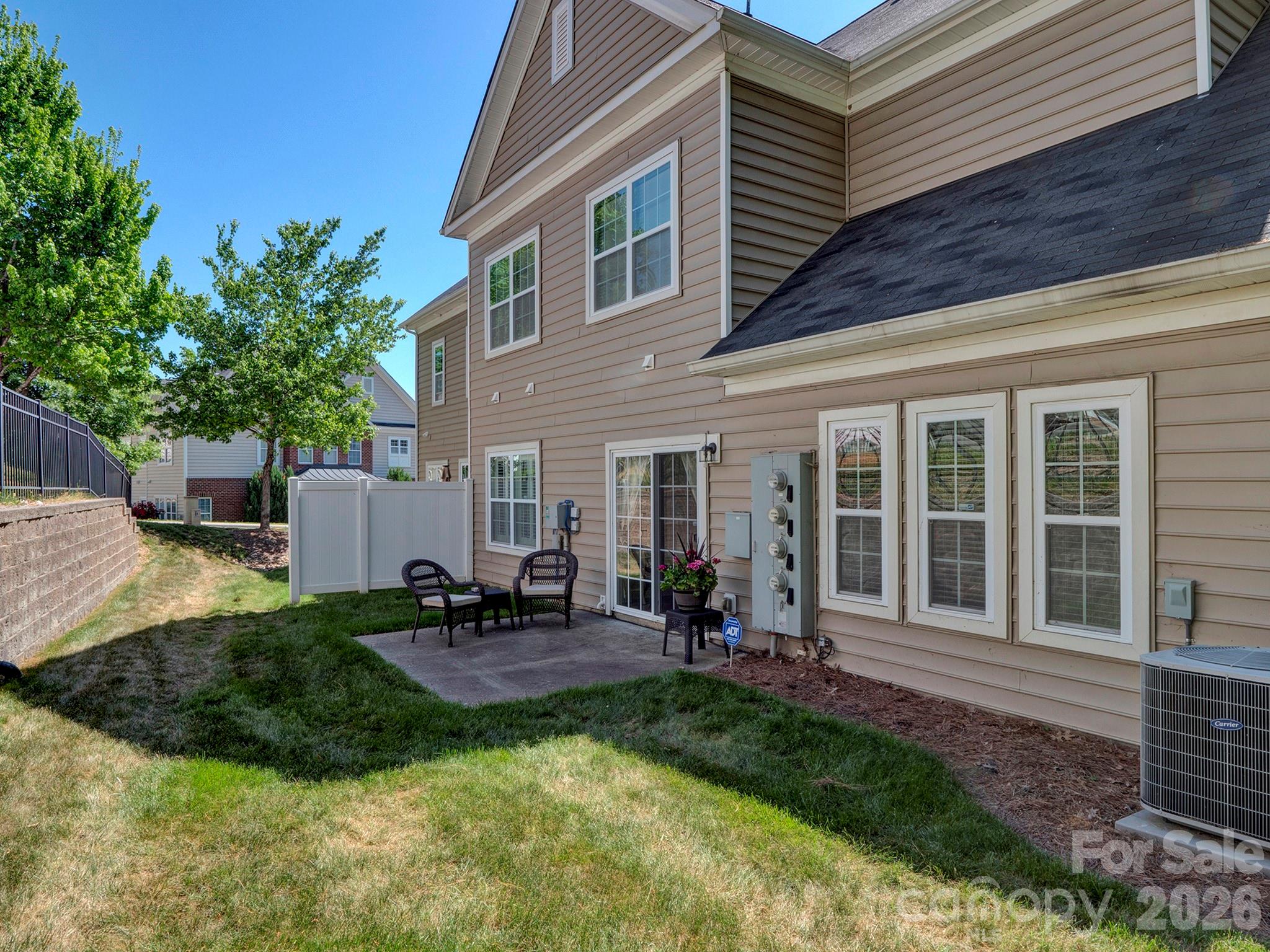14726 Intermilan Way Charlotte, NC 28277 - Photo 16 of 38 a view of a house with backyard and sitting area