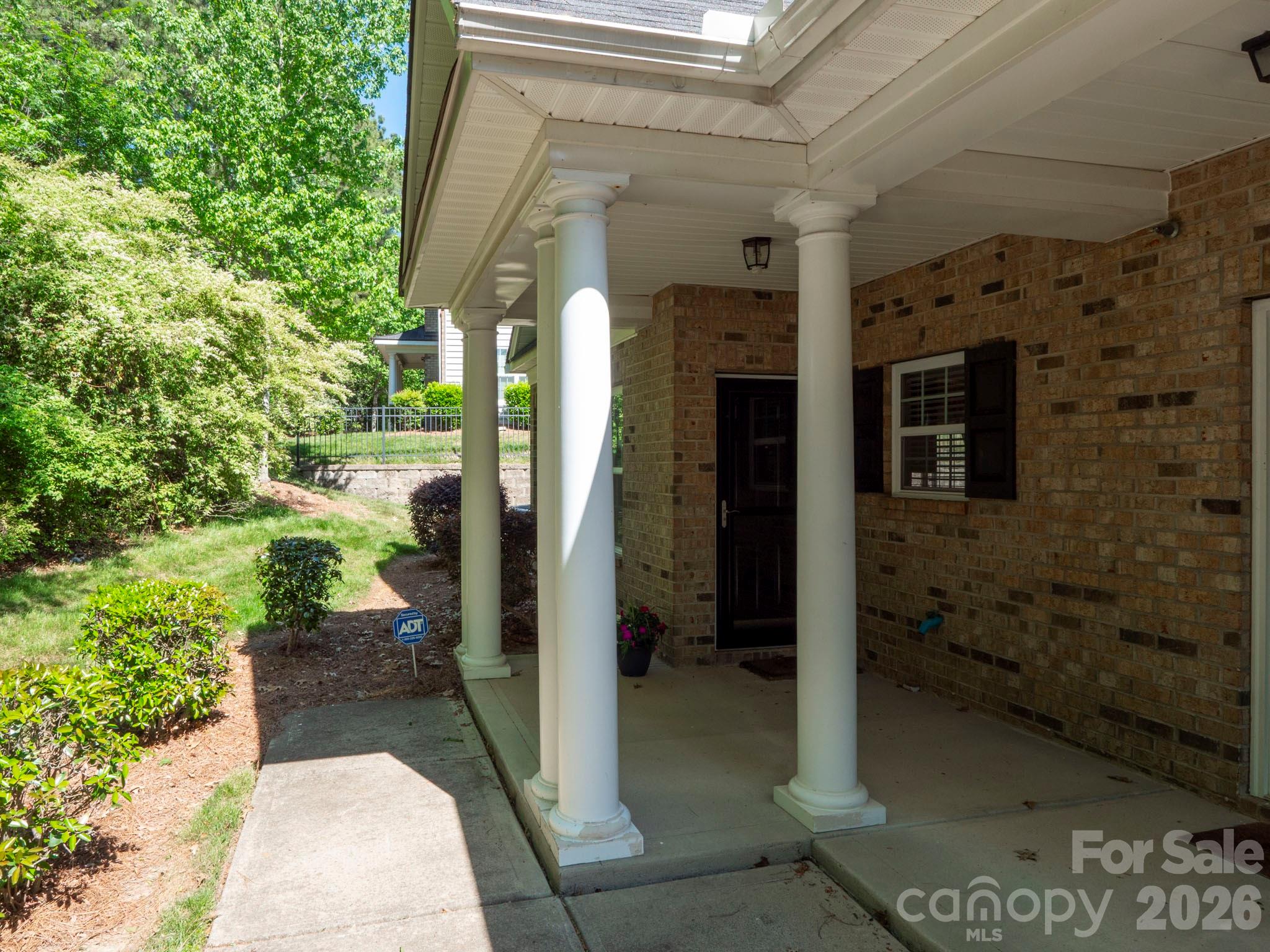 14726 Intermilan Way Charlotte, NC 28277 - Photo 2 of 38 a view of a pathway of a building