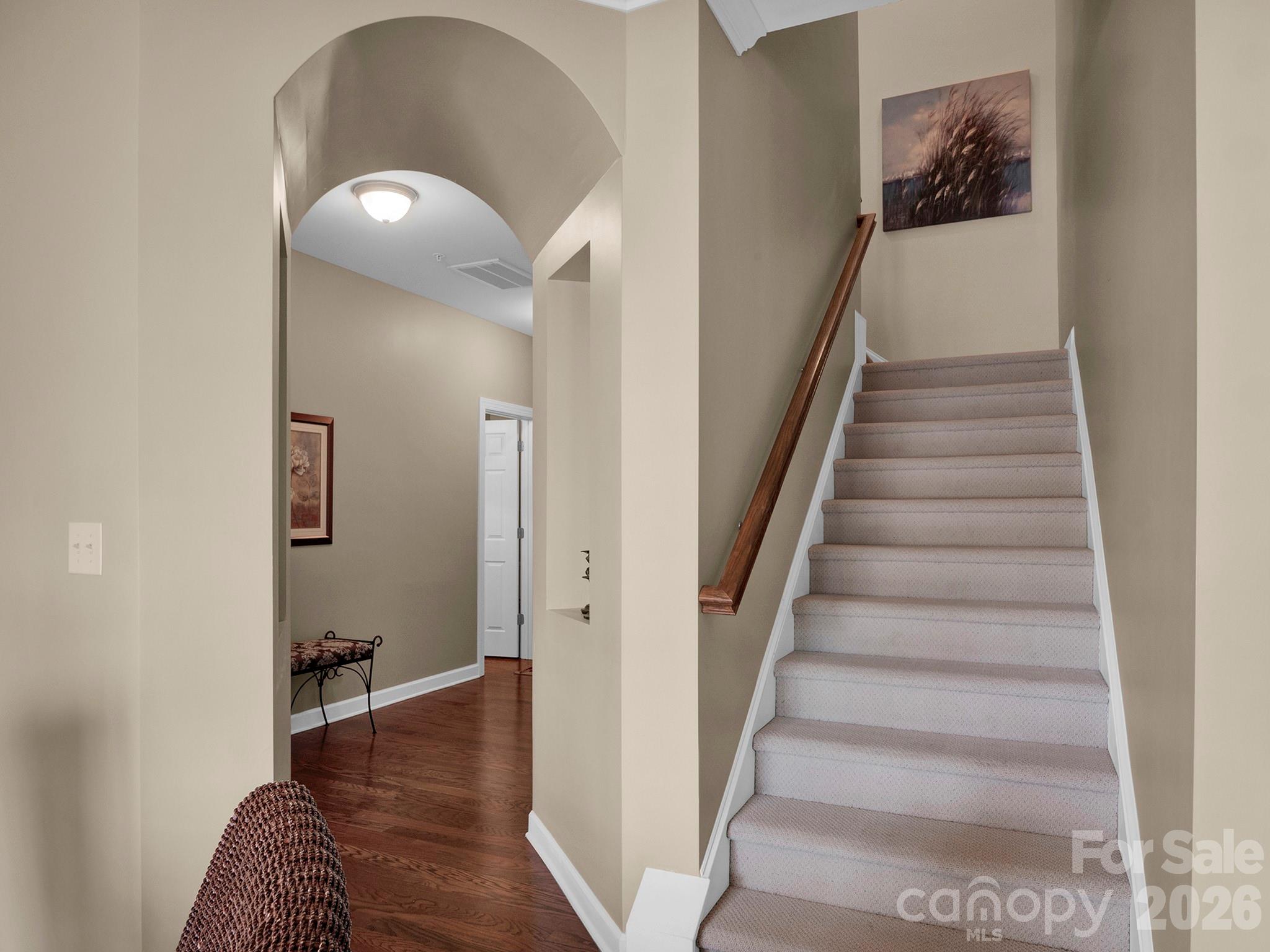14726 Intermilan Way Charlotte, NC 28277 - Photo 26 of 38 a view of entryway and hall with wooden floor