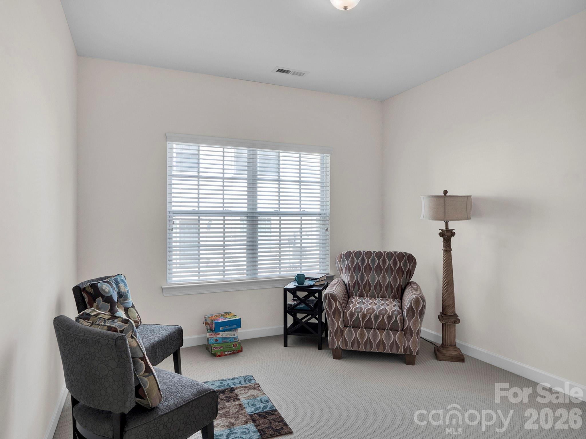 14726 Intermilan Way Charlotte, NC 28277 - Photo 33 of 38 a living room with furniture and a window