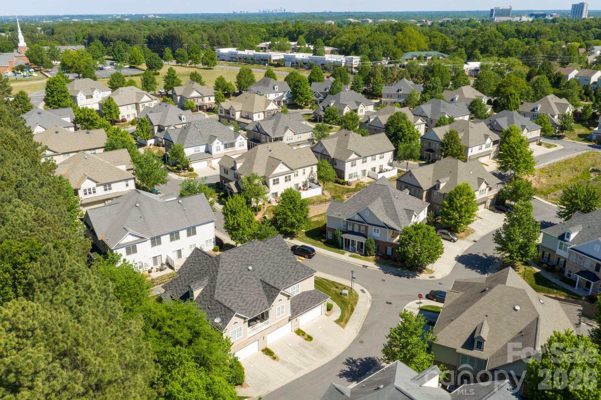 14726 Intermilan Way Charlotte, NC 28277 - Photo 34 of 38 an aerial view of residential houses with outdoor space