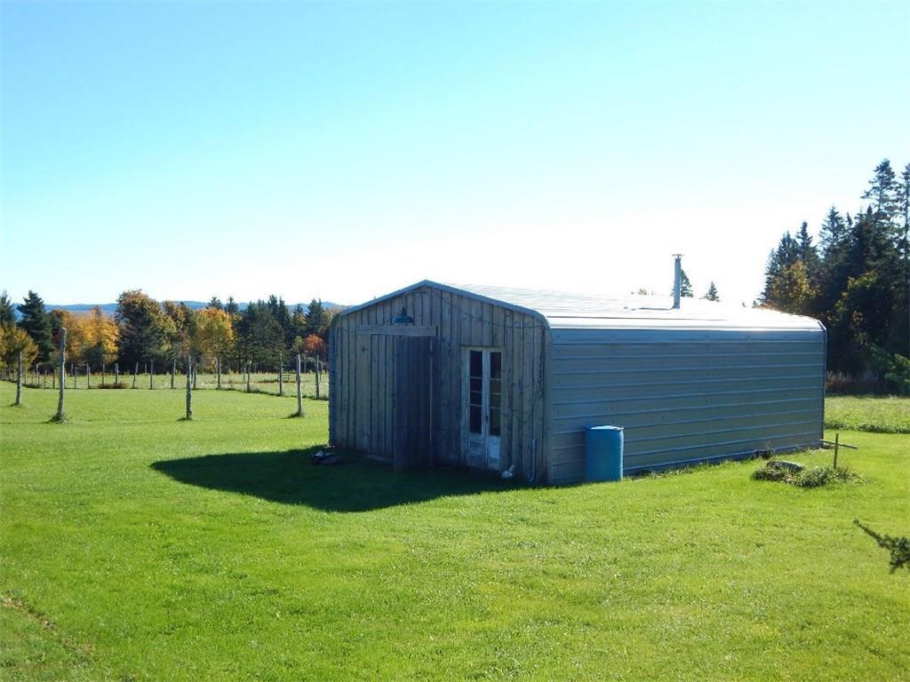576 Shore Road Perry, ME 04667 - Photo 10 of 34 Work shop and the pasture