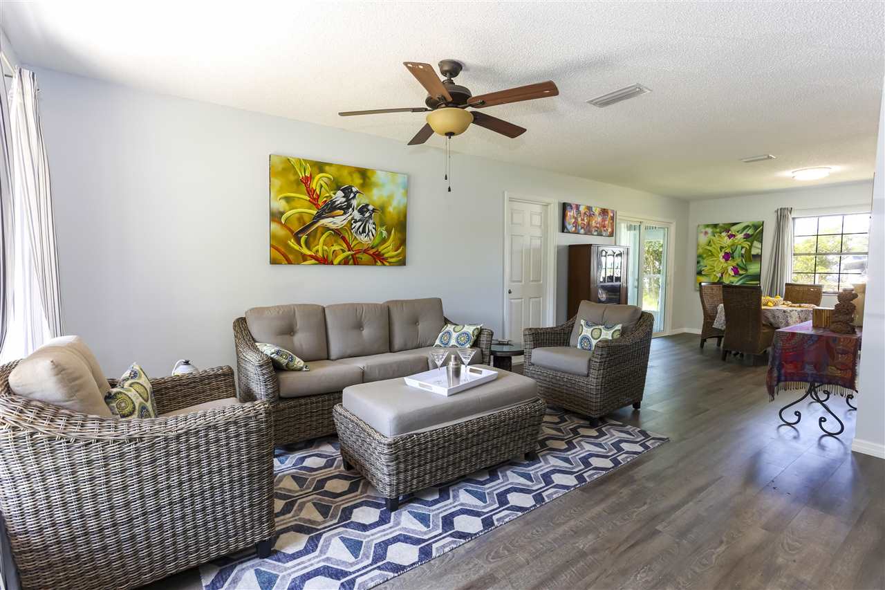 162 Segovia Road St. Augustine, FL 32086 - Photo 2 of 29 a living room with furniture and wooden floor