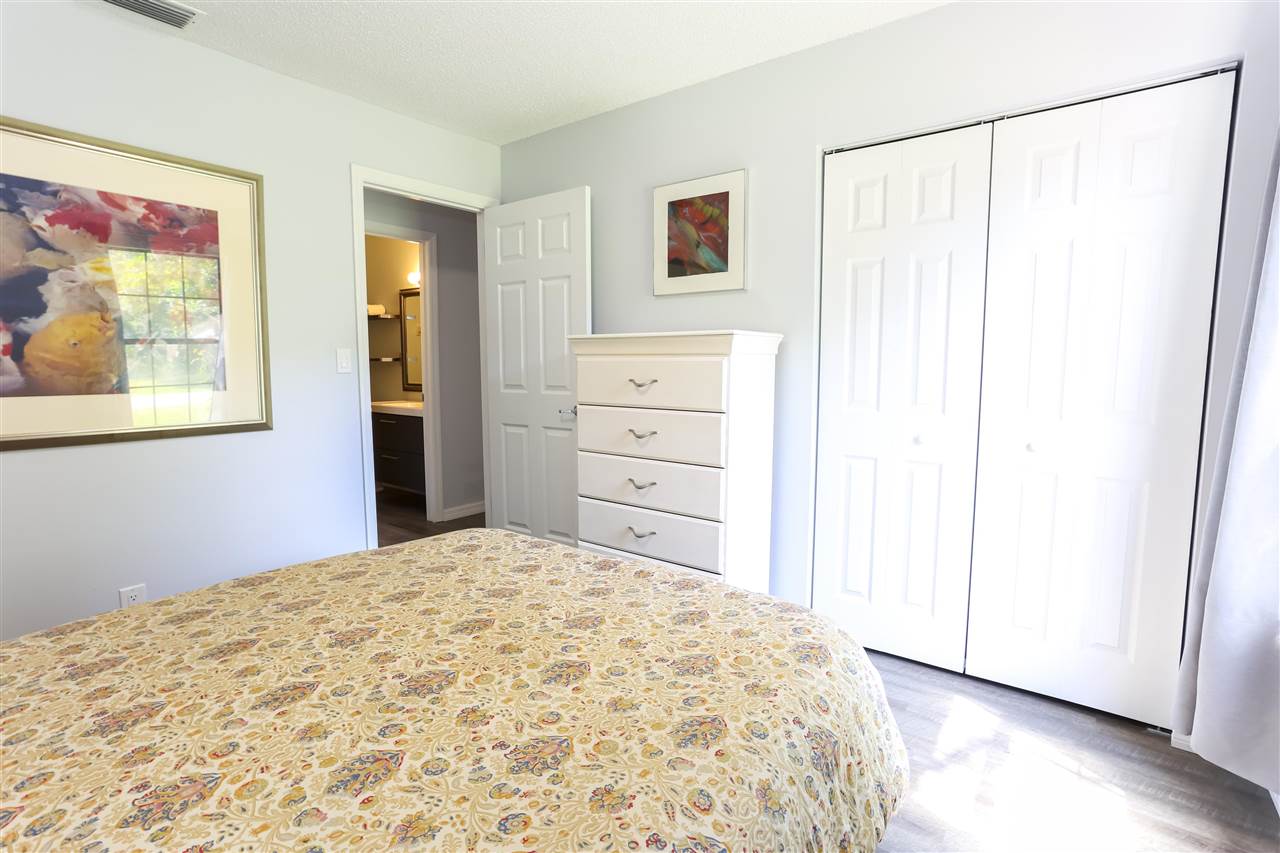 162 Segovia Road St. Augustine, FL 32086 - Photo 15 of 29 a bedroom with a bed and a window