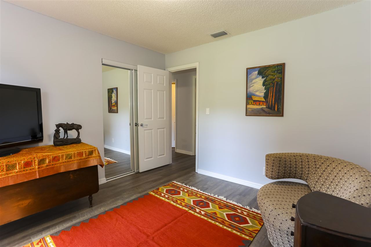 162 Segovia Road St. Augustine, FL 32086 - Photo 17 of 29 a bedroom with a bed and couch