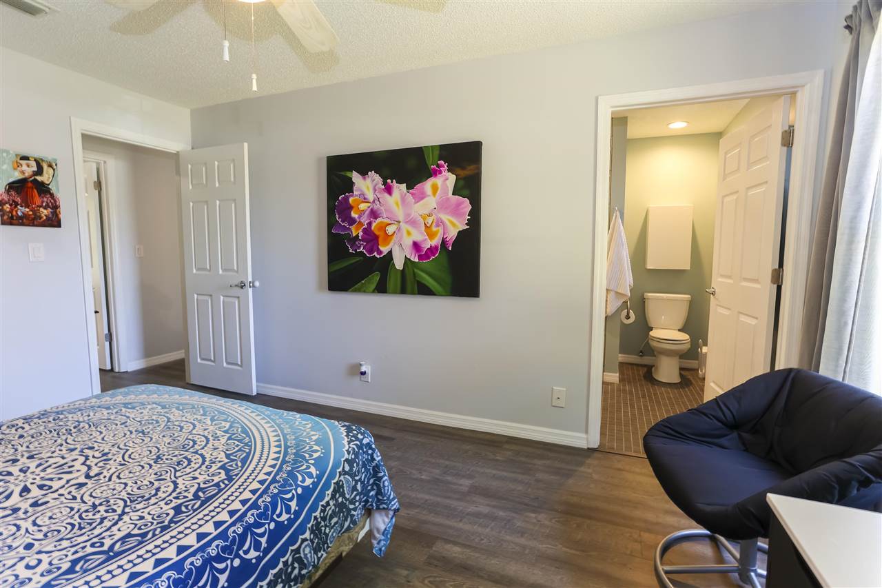 162 Segovia Road St. Augustine, FL 32086 - Photo 20 of 29 a bedroom with a bed and furniture