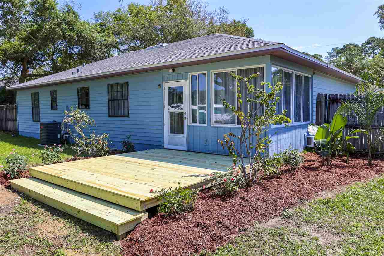 162 Segovia Road St. Augustine, FL 32086 - Photo 22 of 29 a front view of a house with garden