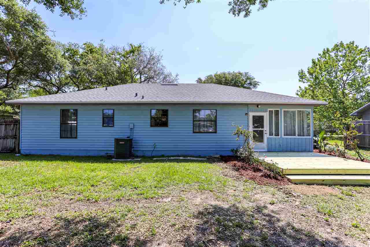 162 Segovia Road St. Augustine, FL 32086 - Photo 23 of 29 a view of a house with a yard