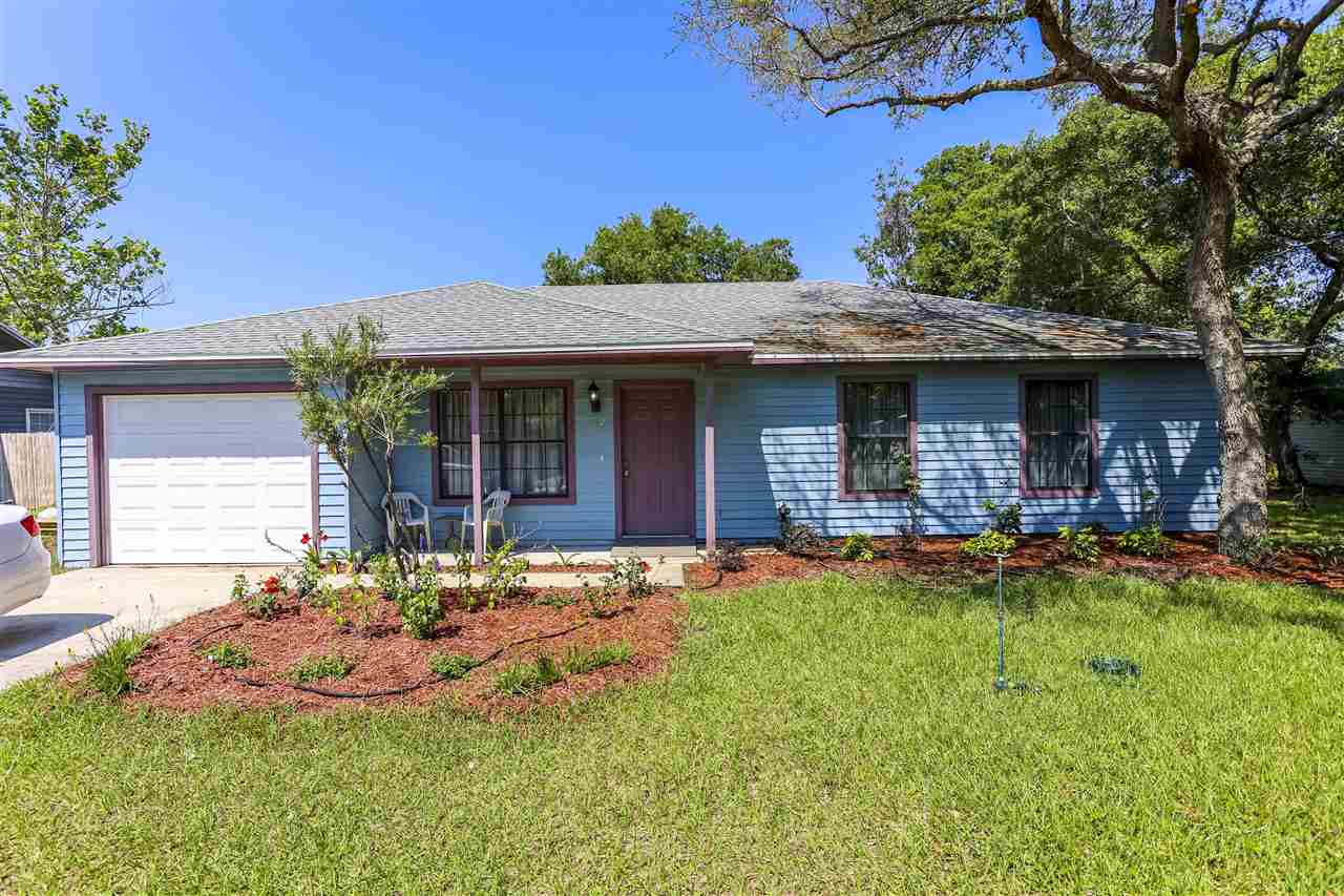 162 Segovia Road St. Augustine, FL 32086 - Photo 24 of 29 a front view of a house with patio