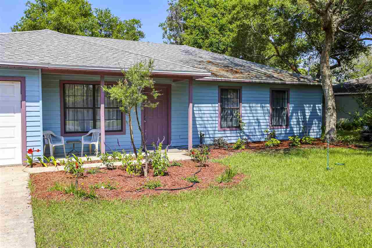 162 Segovia Road St. Augustine, FL 32086 - Photo 28 of 29 a front view of a house with yard and green space