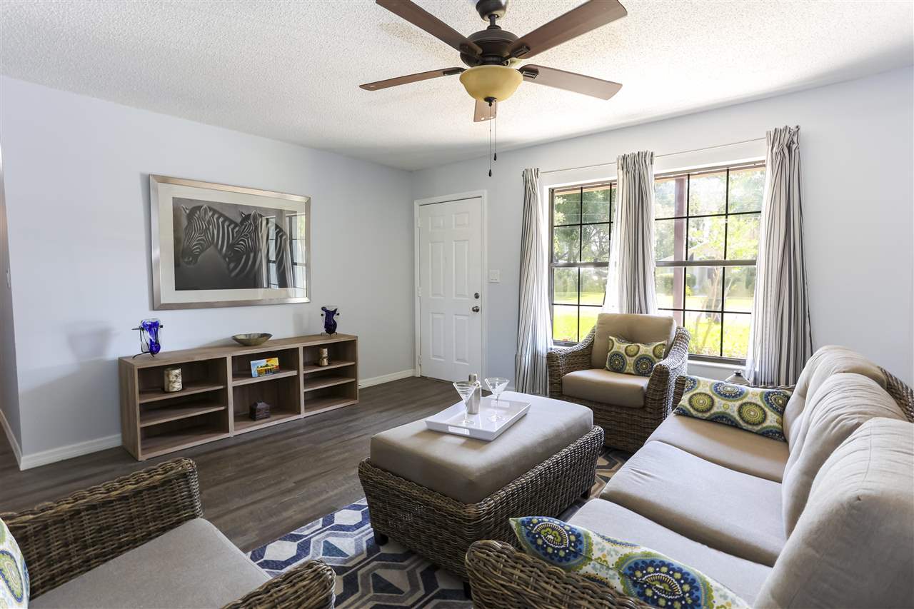 162 Segovia Road St. Augustine, FL 32086 - Photo 4 of 29 a living room with furniture and a window