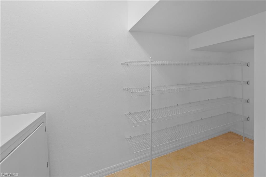 15243 Summit Pl Circle, Unit 247 Naples, FL 34119 - Photo 12 of 18 a bathroom with a shower