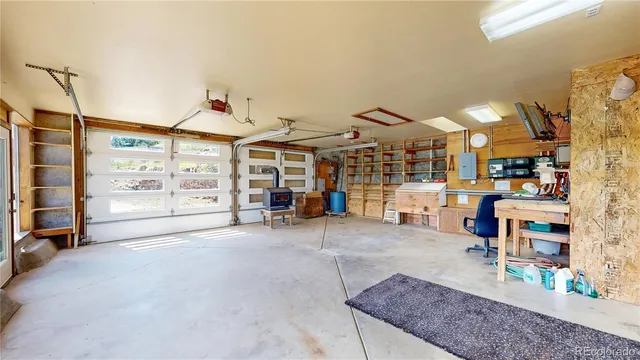 a view of a roof deck with wooden floor and mountain view