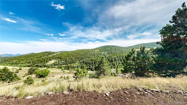 a view of a porch with a floor to ceiling window
