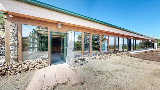 a view of a house with a street