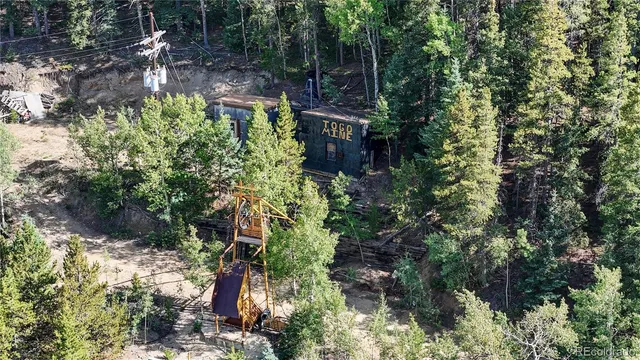 a view of a mountain with a back yard