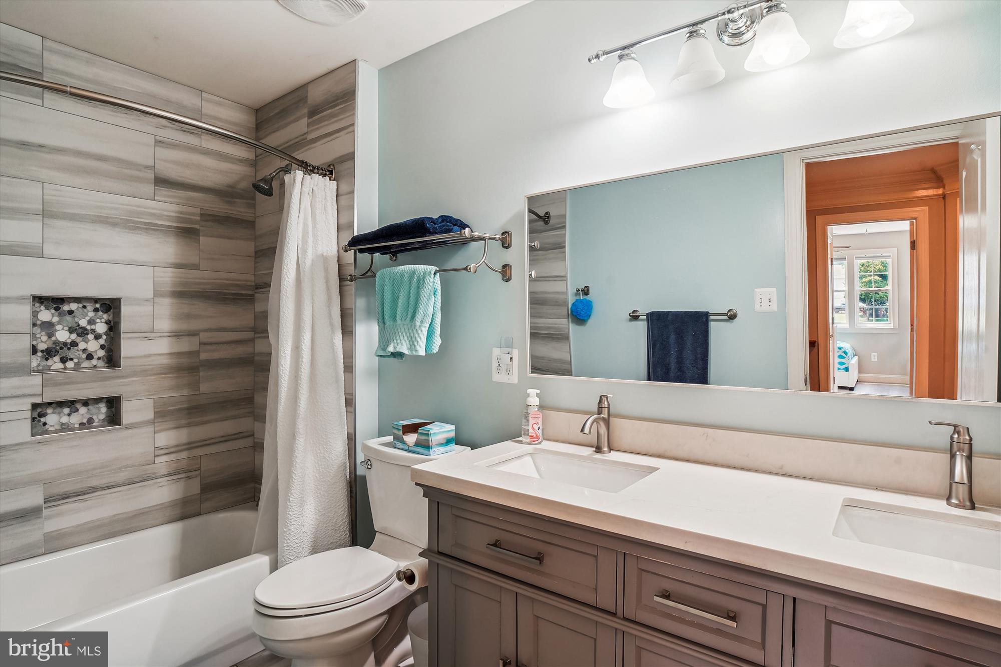3508 Kemptown Church Road Monrovia, MD 21770 - Photo 58 of 111 a bathroom with a sink a toilet and shower
