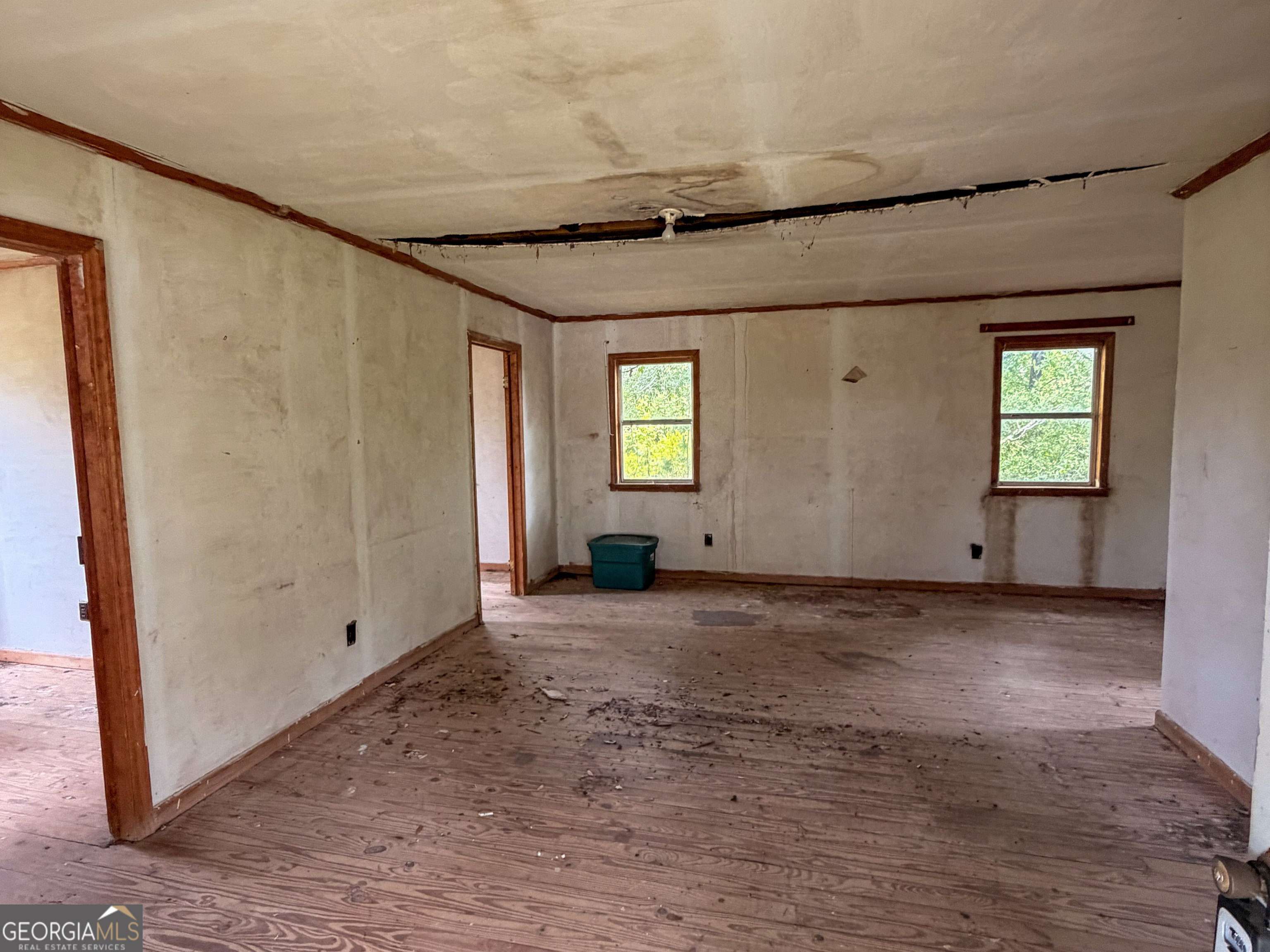 3925 Highway 441 Rentz, GA 31075 - Photo 7 of 16 an empty room with windows