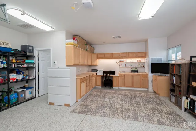 a view of swimming pool with a yard and sitting area