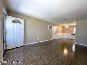 317 3rd Avenue Indialantic, FL 32903 - Photo 18 of 18 a view of an empty room with wooden floor