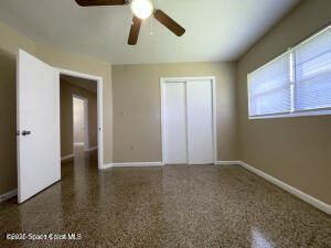 317 3rd Avenue Indialantic, FL 32903 - Photo 10 of 18 an empty room with windows and cabinet