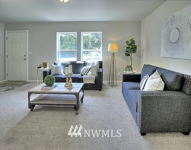 16029 Gibson Road Southwest Tenino, WA 98589 - Photo 11 of 35 a living room with furniture and windows