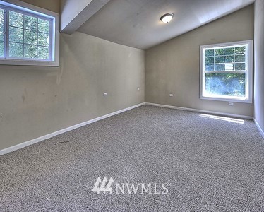 16029 Gibson Road Southwest Tenino, WA 98589 - Photo 29 of 35 an empty room with windows