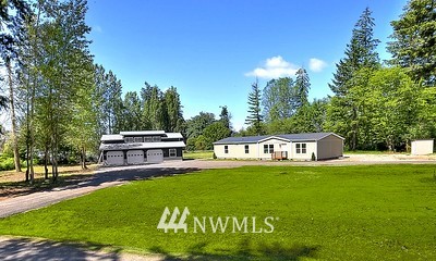 16029 Gibson Road Southwest Tenino, WA 98589 - Photo 4 of 35 a view of a house with a big yard