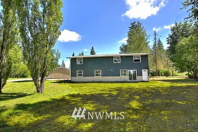 16029 Gibson Road Southwest Tenino, WA 98589 - Photo 6 of 35 a view of a house with a yard