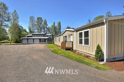 16029 Gibson Road Southwest Tenino, WA 98589 - Photo 7 of 35 a house that has a large window in it
