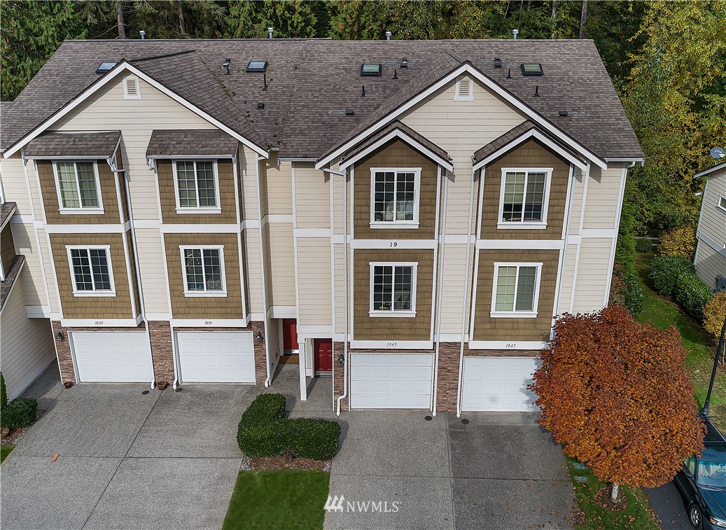 1043 215th Place Southeast Bothell, WA 98021 - Photo 26 of 29 a view of house with a outdoor space