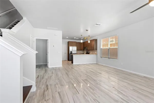 a view of a livingroom with wooden floor
