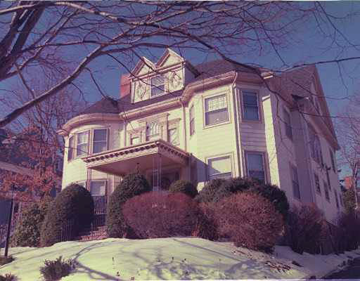 141 Salisbury Road Brookline, MA 02445 - Photo 1 of 1 a front view of a house with a yard