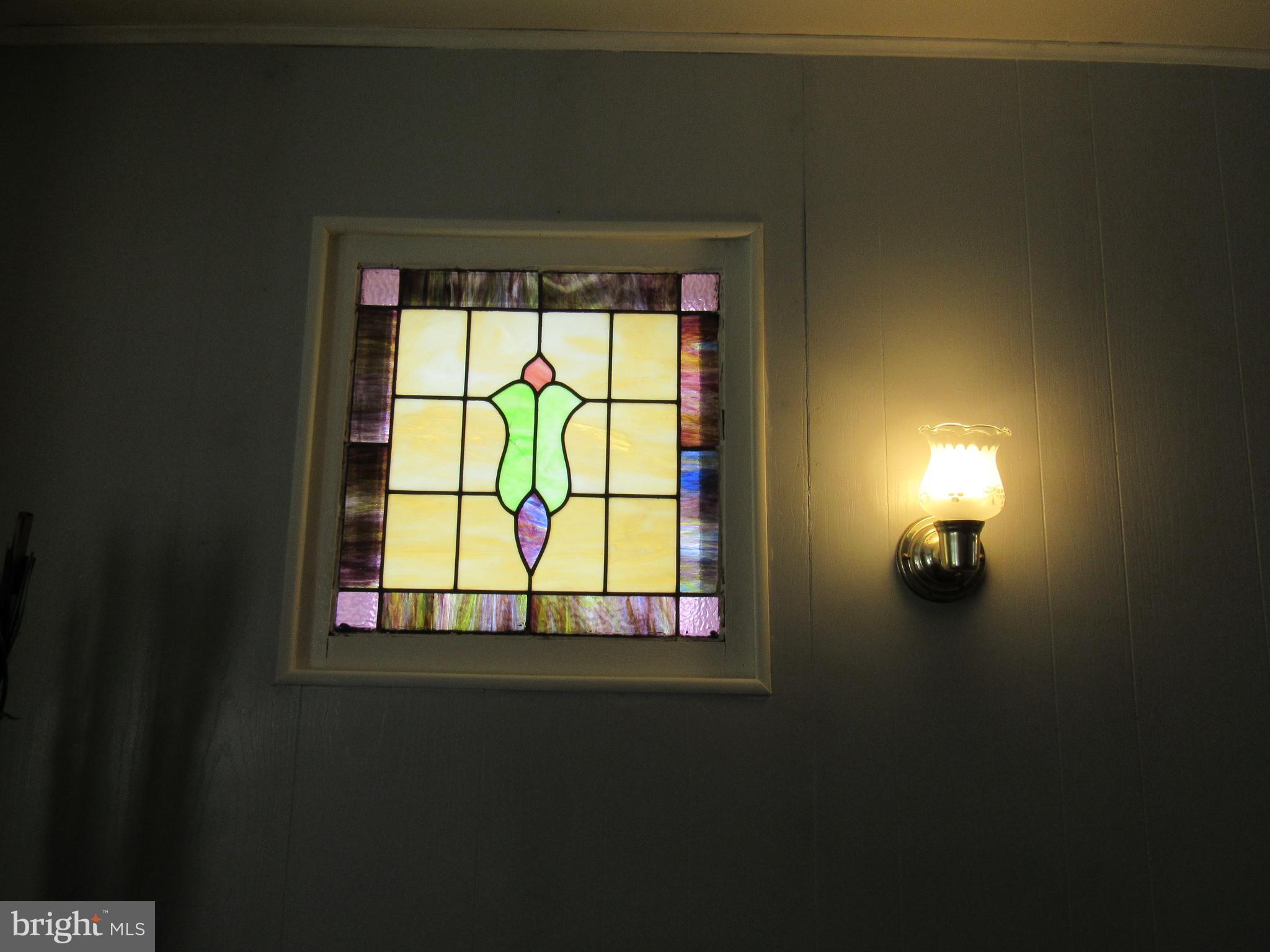 1701 Kinship Road Dundalk, MD 21222 - Photo 12 of 45 Living Room Stained Glass Windows