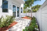 a view of a backyard of the house