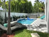 a view of backyard with green space