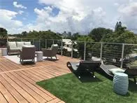 a view of a terrace with furniture