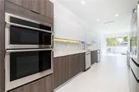 a kitchen with a stove and a microwave