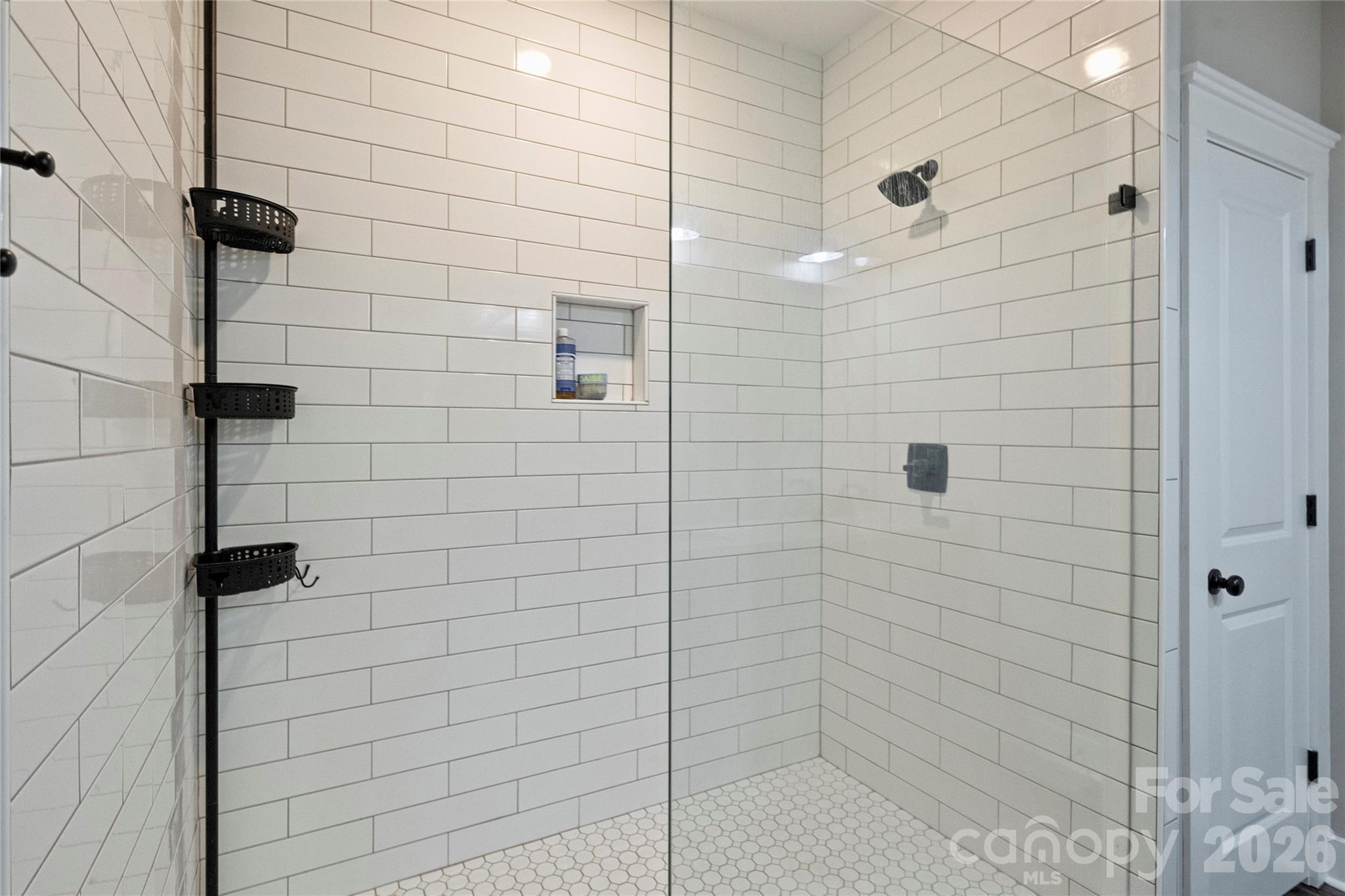 606 Elm Street Locust, NC 28097 - Photo 15 of 23 a bathroom with a shower