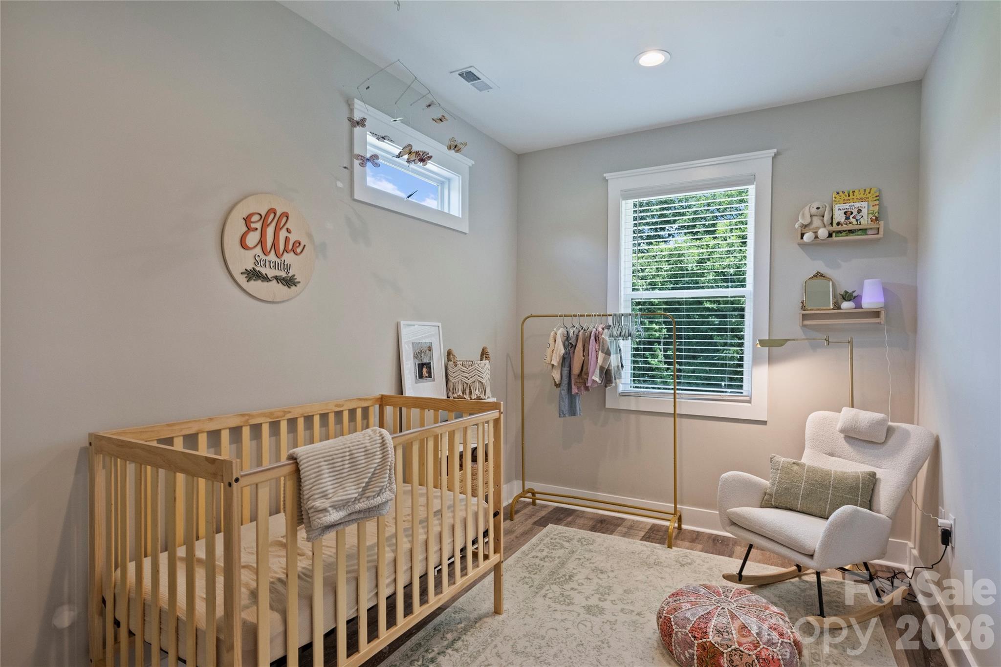 606 Elm Street Locust, NC 28097 - Photo 17 of 23 a bedroom with furniture and a window