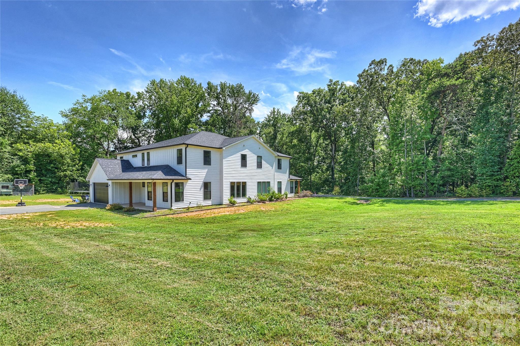 606 Elm Street Locust, NC 28097 - Photo 23 of 23 a house with a outdoor space