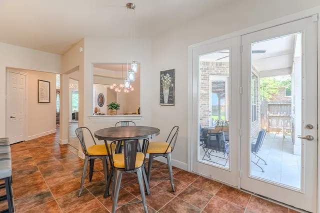 a bathroom with a sink a mirror and a toilet
