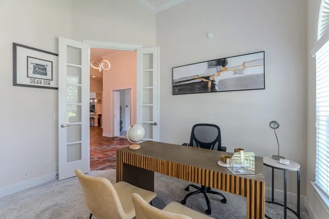 a bathroom with a sink a mirror a toilet and a shower