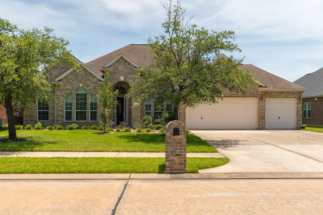 a view of a livingroom with furniture and a window