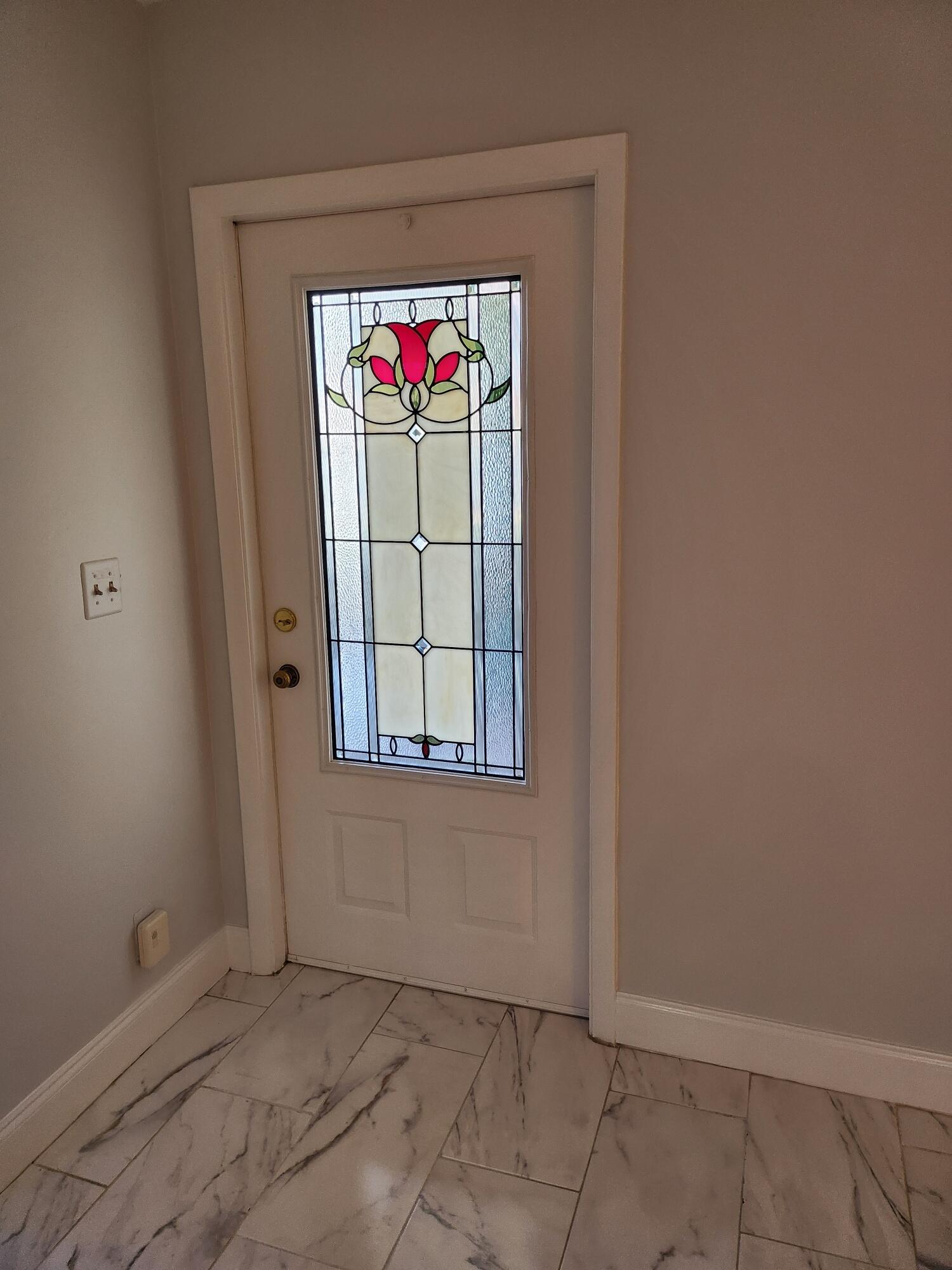 5433 Lakefront Boulevard, Unit B Delray Beach, FL 33484 - Photo 10 of 13 an empty room with toys