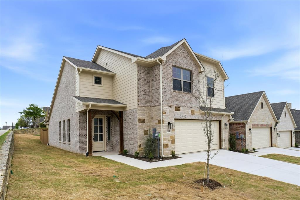 201 Legacy Boulevard Weatherford, TX 76085 - Photo 1 of 25 a front view of a house with a yard