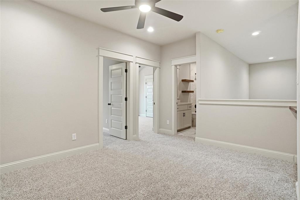 201 Legacy Boulevard Weatherford, TX 76085 - Photo 20 of 25 an empty room with closet and windows