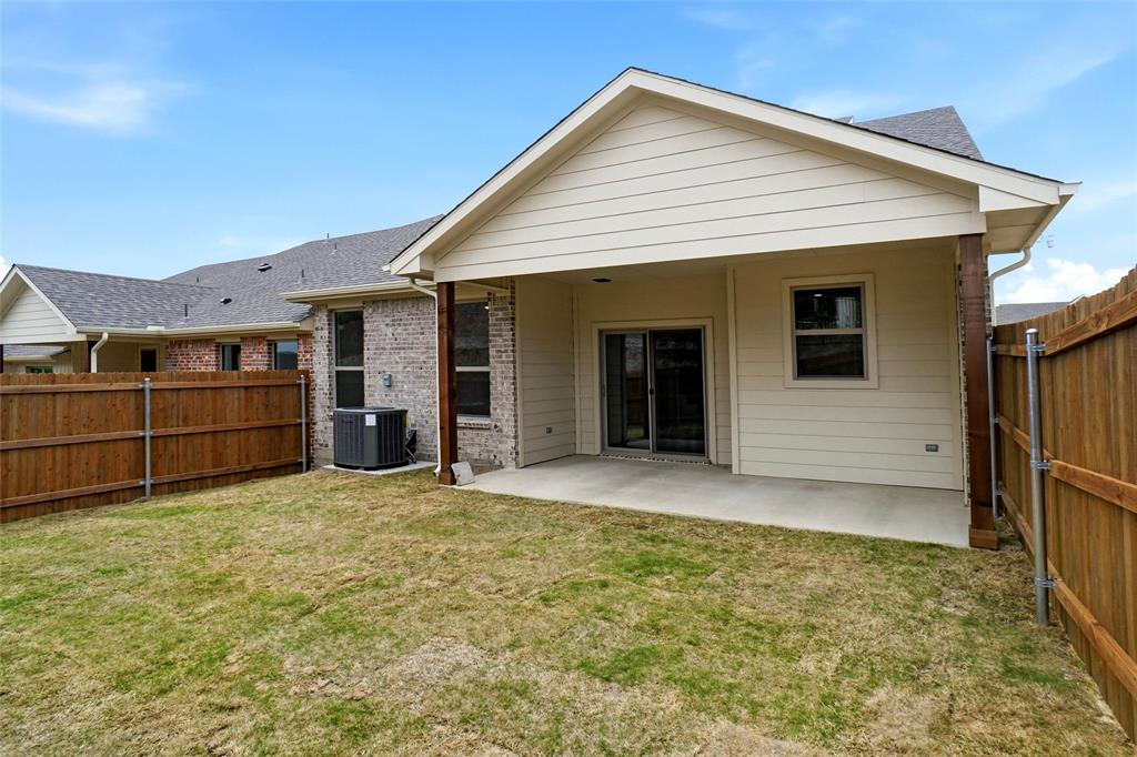 201 Legacy Boulevard Weatherford, TX 76085 - Photo 25 of 25 a view of a house with a yard