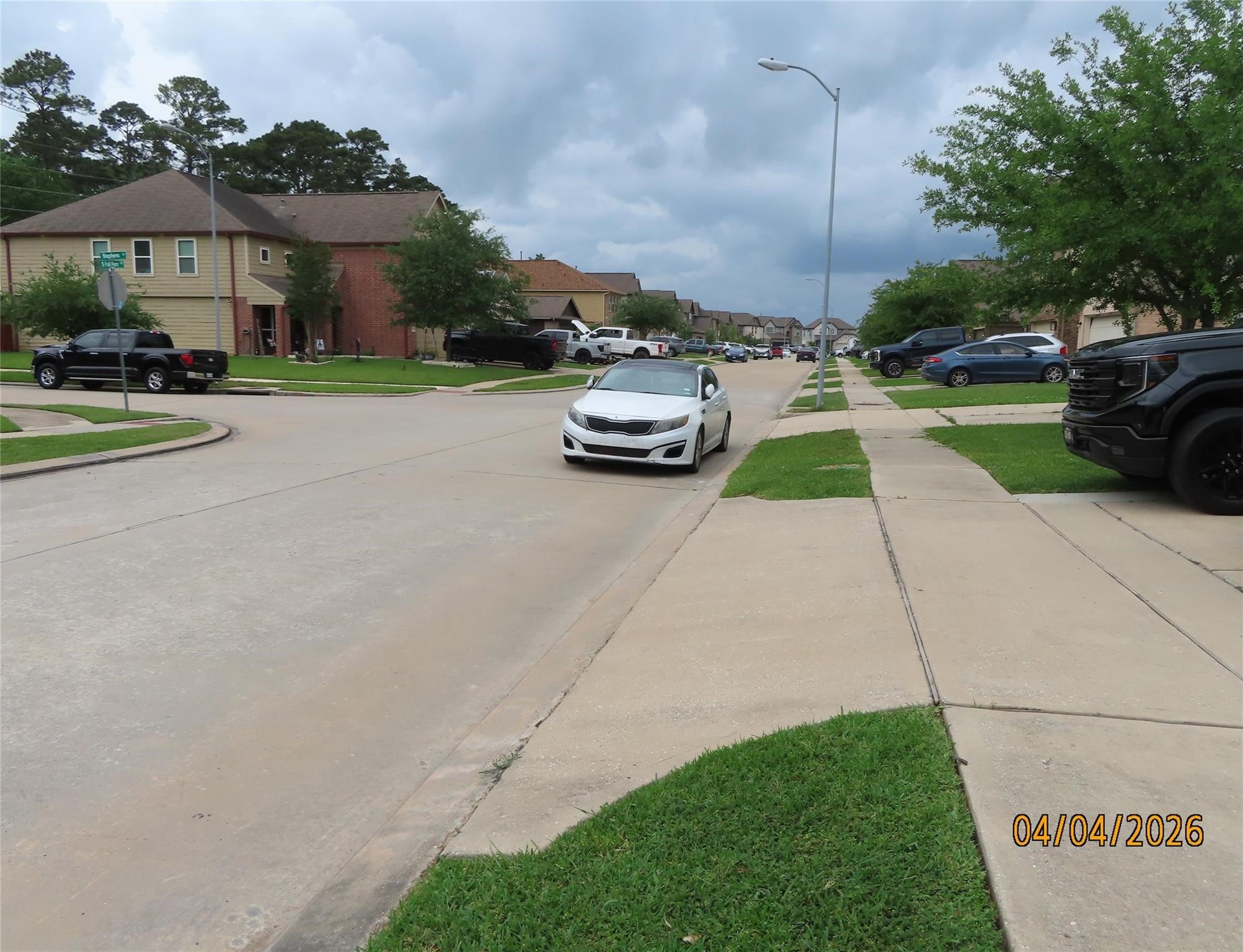 15631 South Fall Fern Circle Houston, TX 77044 - Photo 25 of 25 Peaceful street view in a welcoming neighborhood.