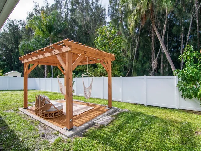 a view of a backyard with plants
